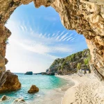 Beach holiday on the sea in Corfu island, Ionian sea, in summer holiday in Greece